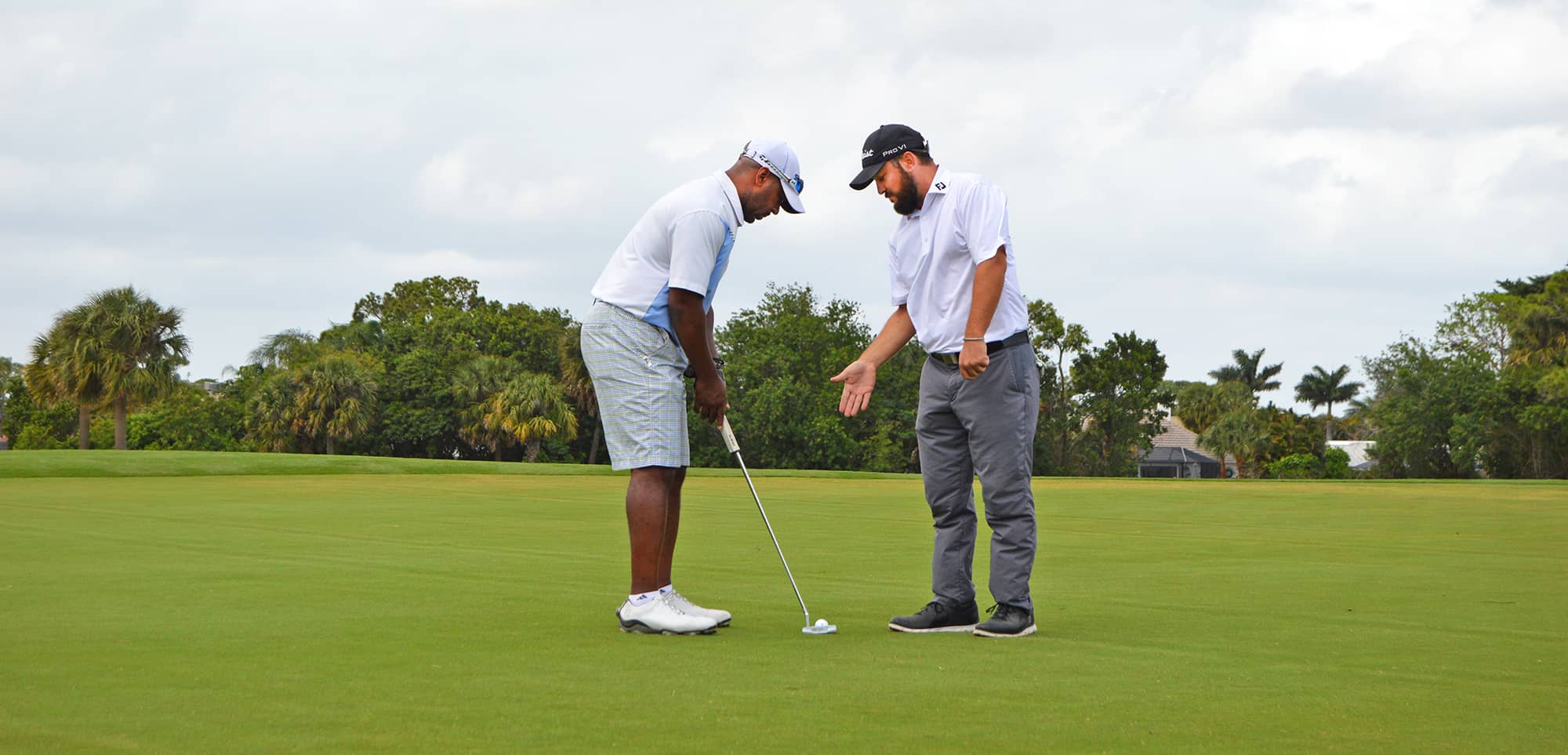 A golfer getting instruction 