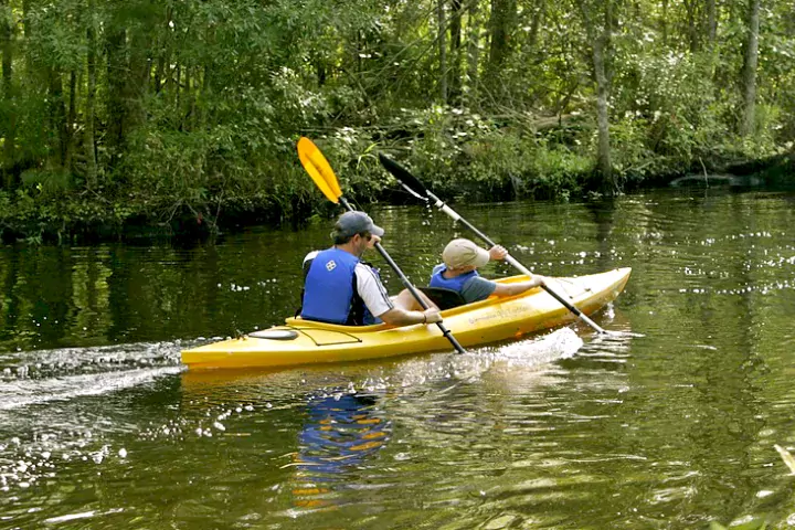 A father and child in a kayak
