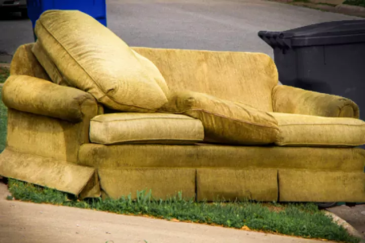 A couch on a curb