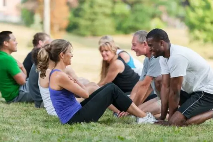 group of people exercising outdoors