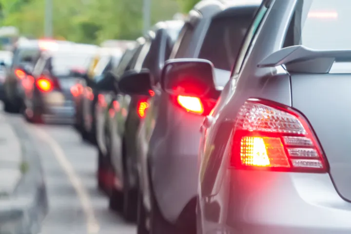 A line of cars in traffic.