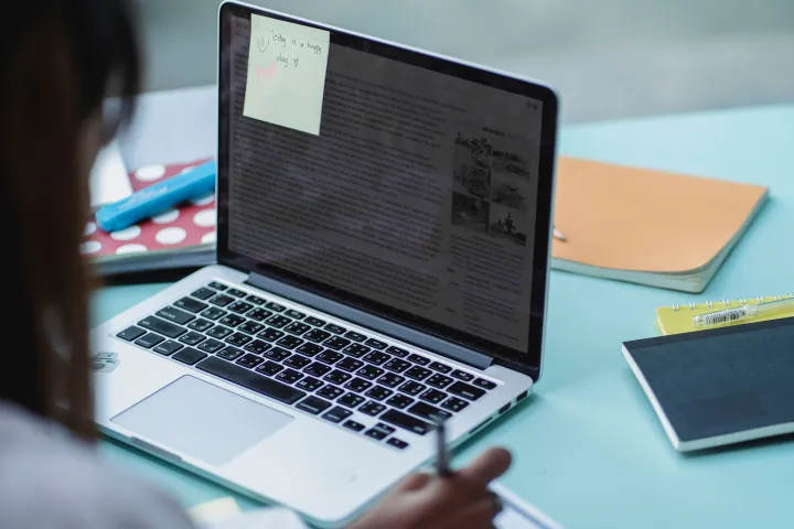 Student using laptop computer