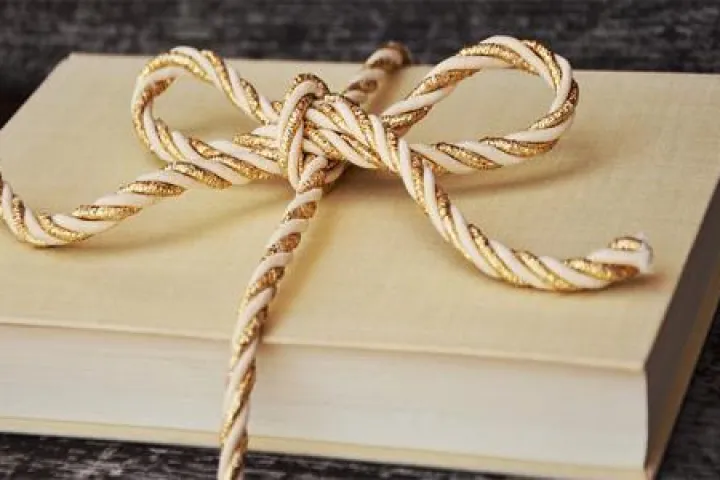 book tied with ribbon
