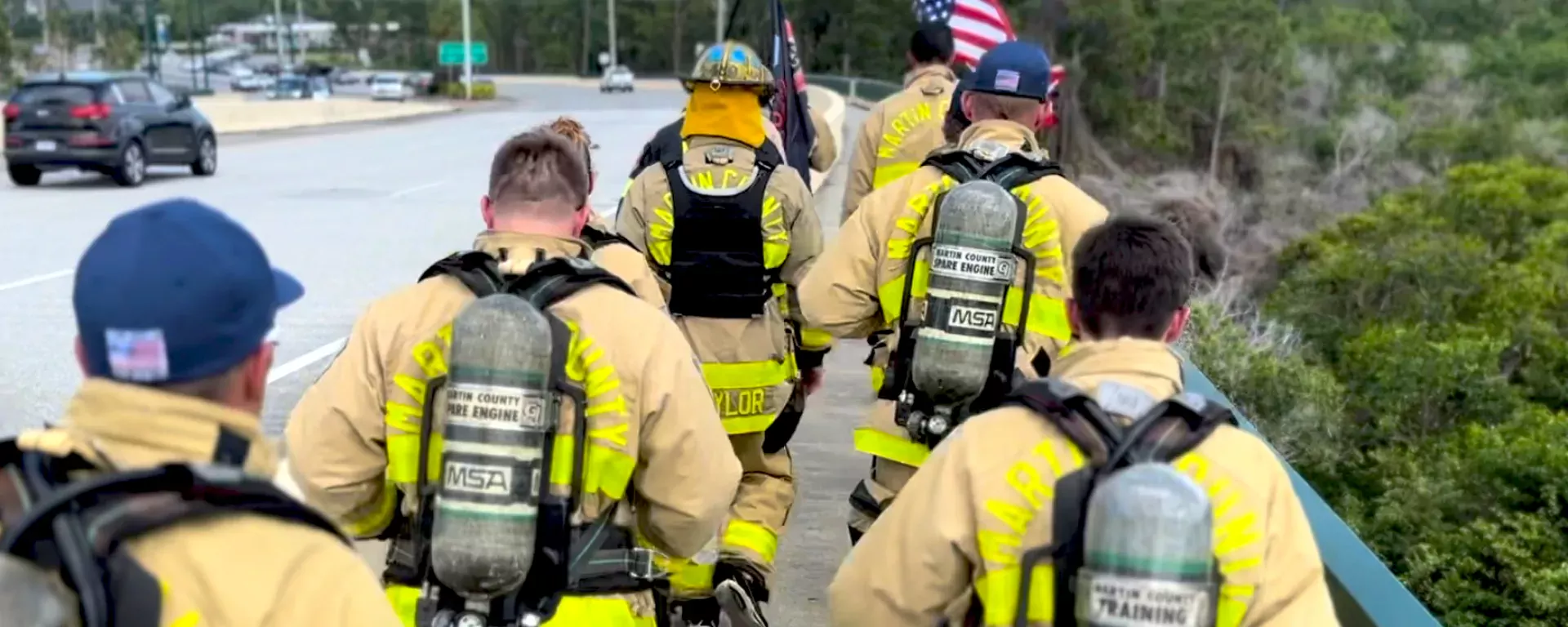 A group of firefighters training together in fire gear