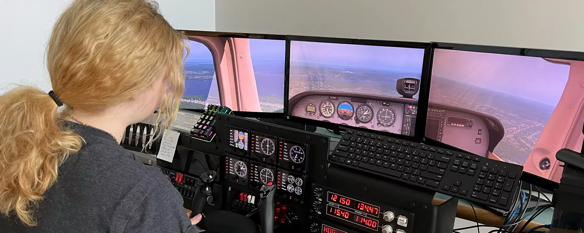 Student flying the flight simulator