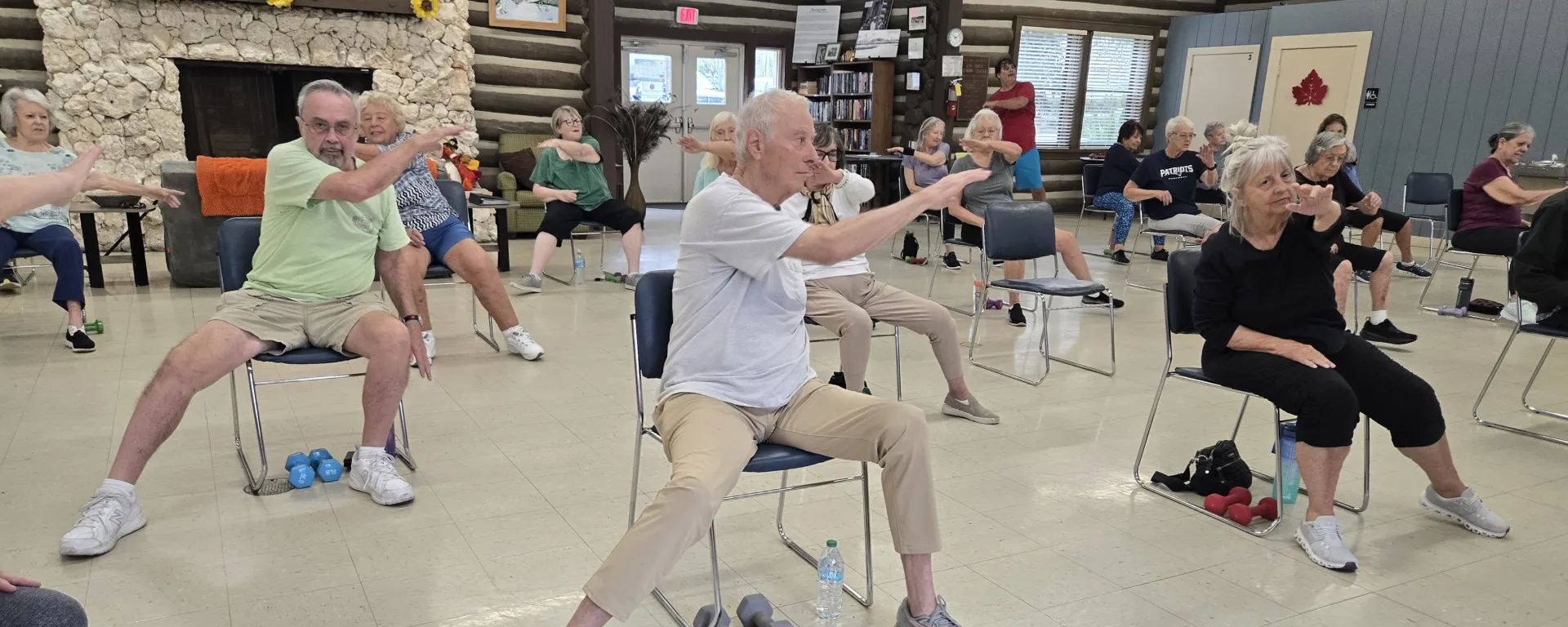 Group of seniors at a workout class at the log cabin senior center