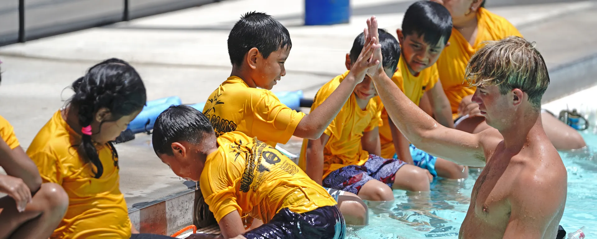 Summer camp kids at a swim lesson