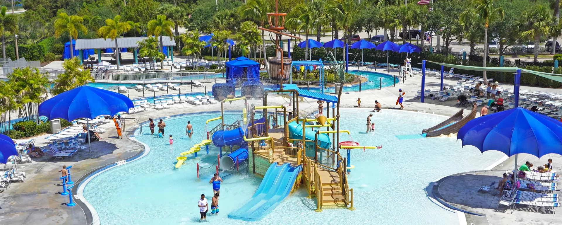 People around the Interactive Splash Playground at Sailfish Splash Waterpark