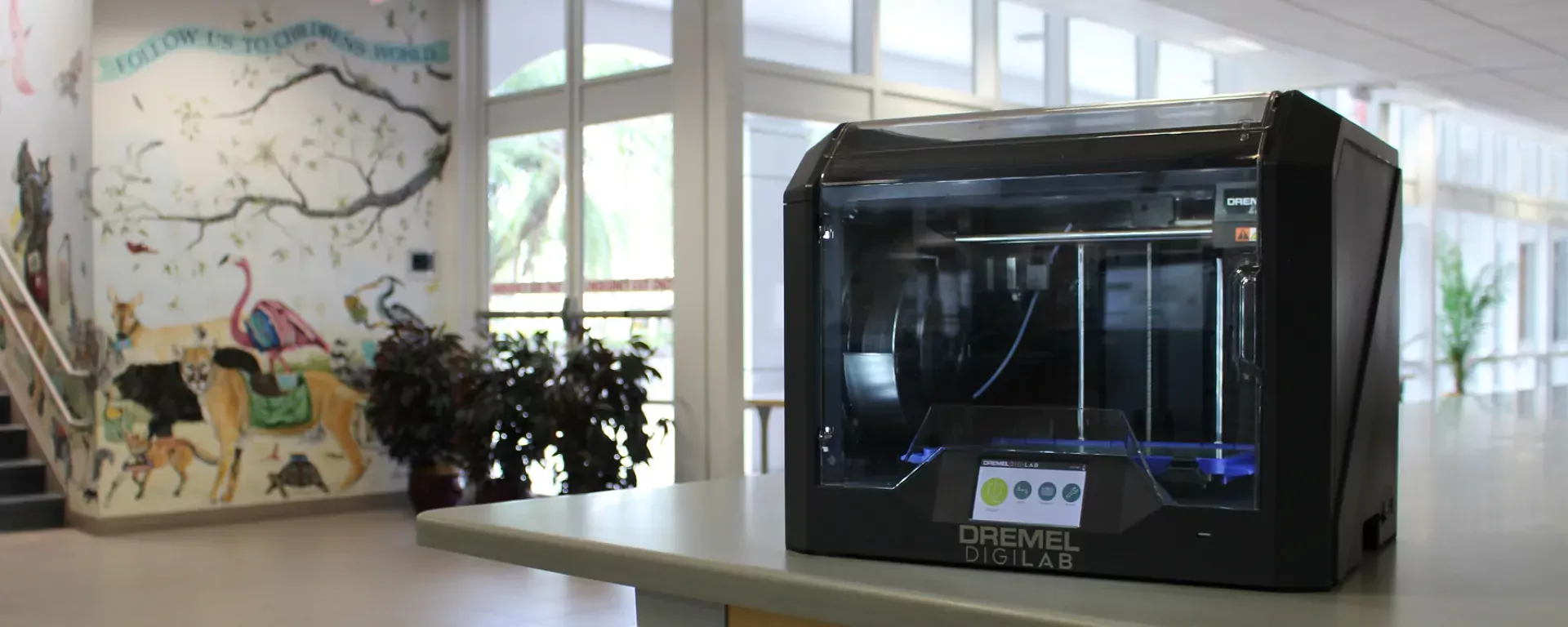 photo of 3D printer in library lobby