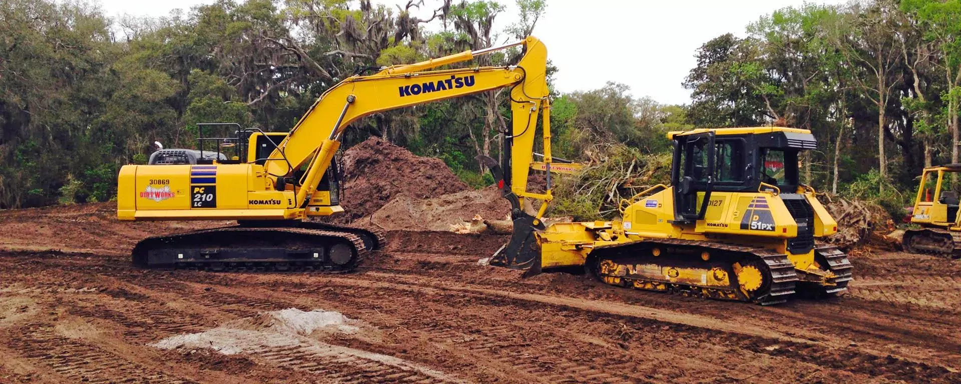 Land clearing equipment on a site