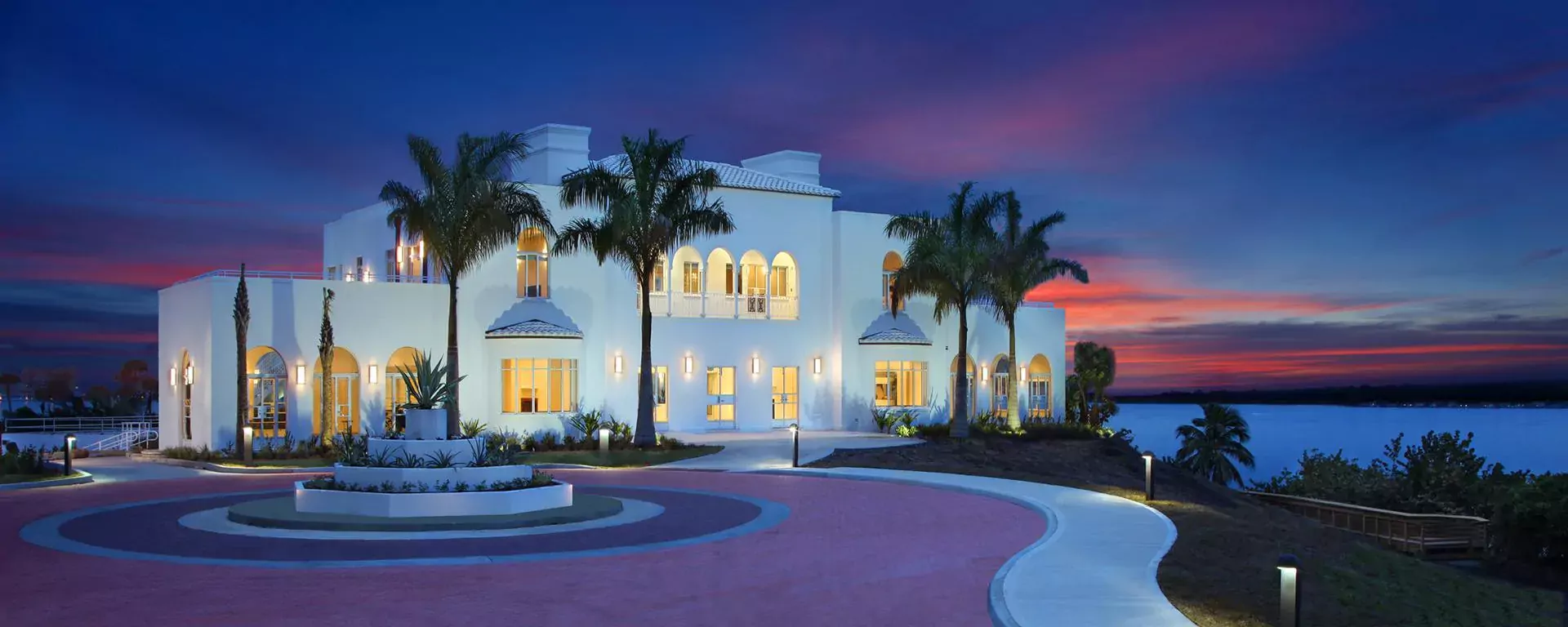 Exterior of The Mansion at Tuckahoe (Leach Mansion), a 1938 Mediterranean Revival estate above the Indian River Lagoon in Jensen Beach, Florida.