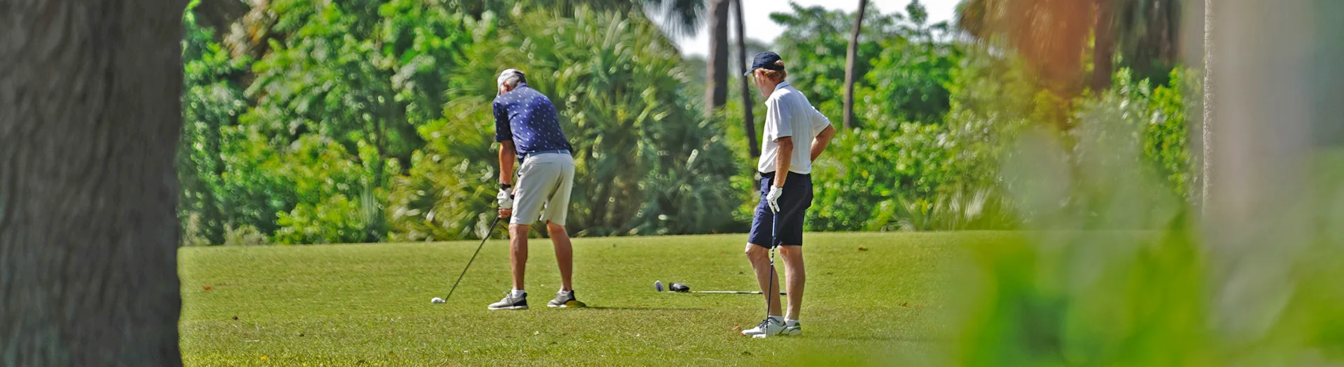 Two golfers on the Sailfish 18 Course at Sailfish Sands Golf Course