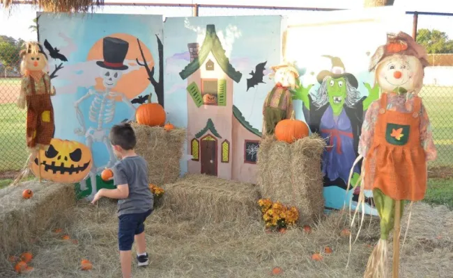 Children enjoying fall fest activities.