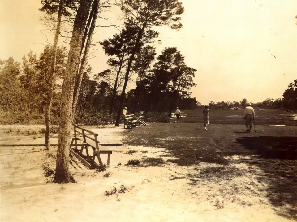 Golf course historical photo showing a group of golfers