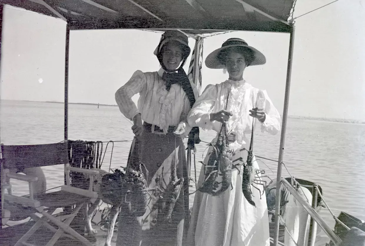 Women with lobsters, c. 1910