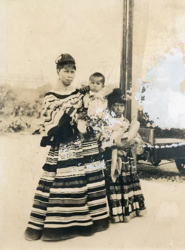 Seminole woman with infant and child