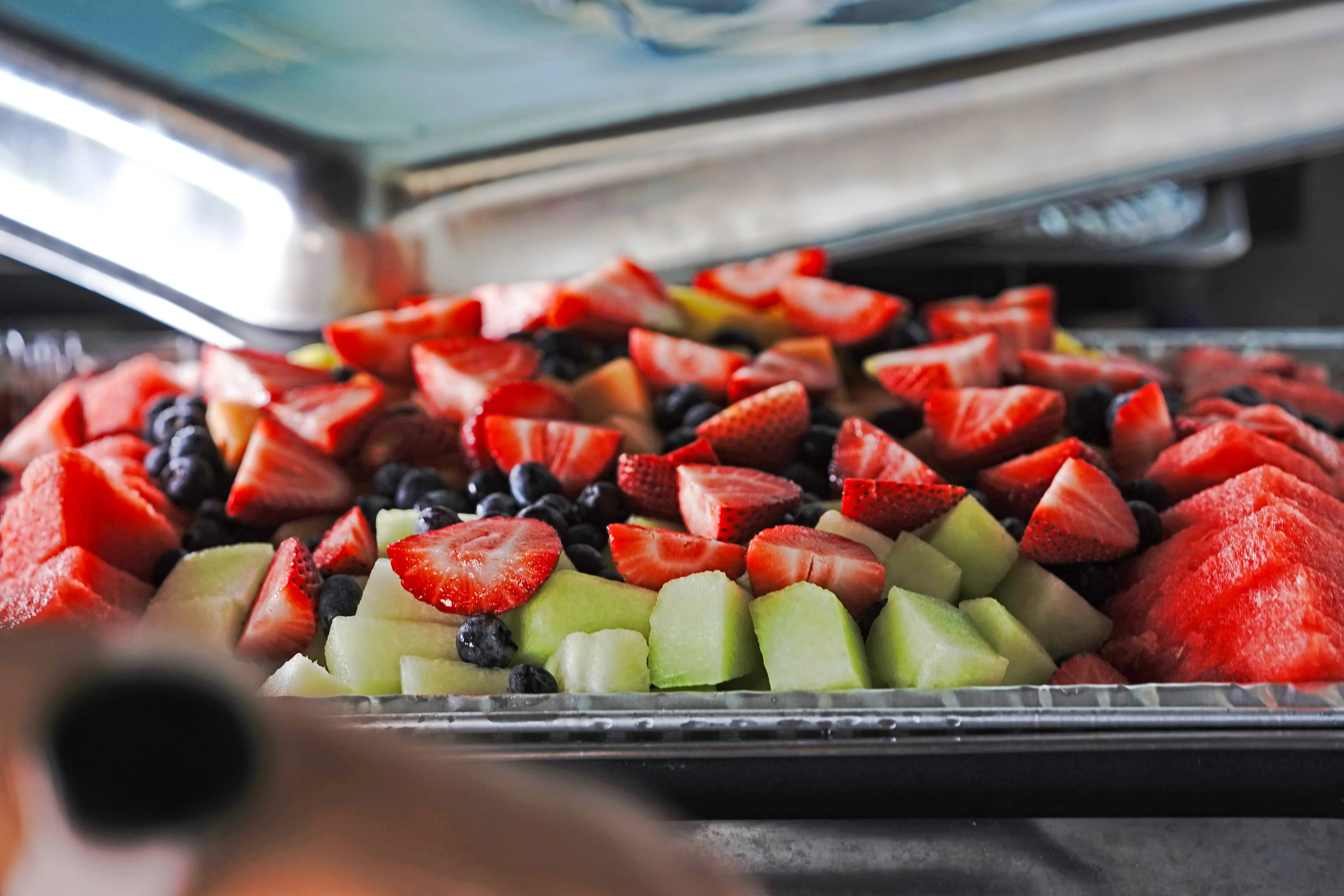 Assorted fruit in a catering chafer
