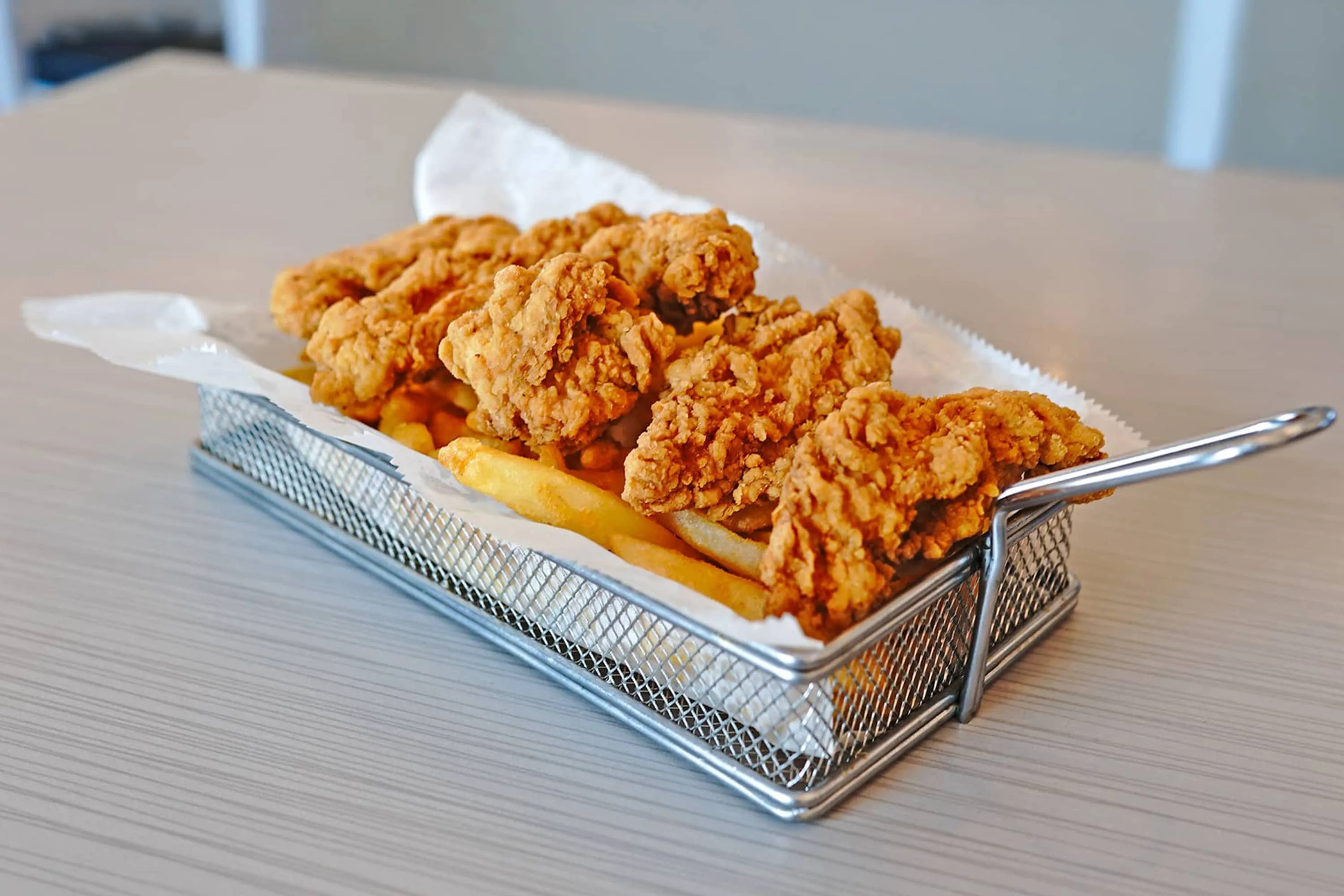 Chicken tenders with a side of fries at Sailfish Sands Hitting Bays
