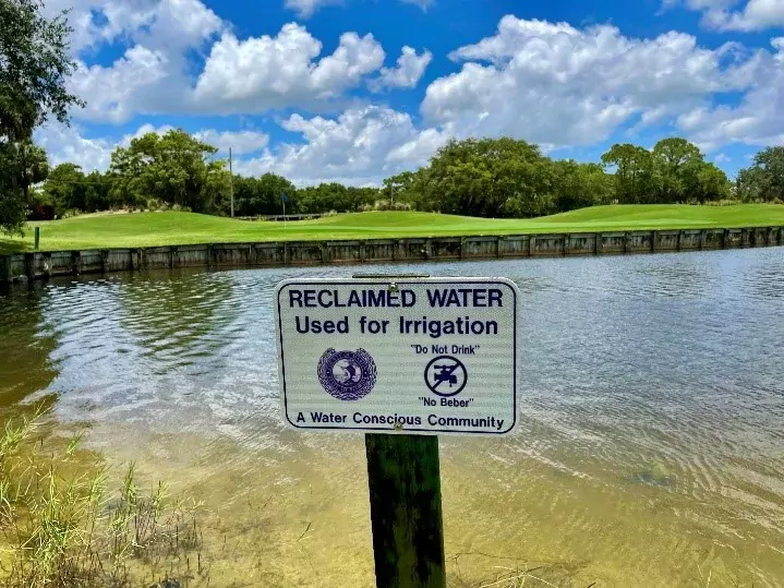 Reclaimed water signage in a lake
